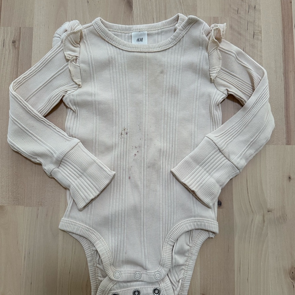 Cotton Cream Ribbed Bodysuit with Ruffle Sleeves - Adjustable - 6-9M